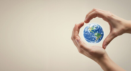 Hands making a heart shape around the glowing planet Earth. Environmental conservation and global care concept. Love and protection for the world with copy space