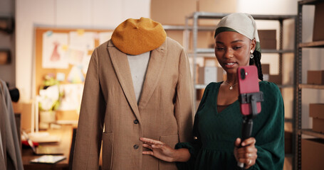 Black woman, live streaming and fashion startup with cellphone for content creation African person, connection or entrepreneur with ecommerce promotion, advertising clothes on social media or talking