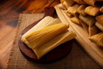 Tamales. Traditional dish typical of Mexico and some Latin American countries. Corn dough wrapped in corn leaves. The tamales are steamed.