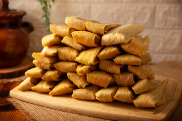 Tamales. Traditional dish typical of Mexico and some Latin American countries. Corn dough wrapped in corn leaves. The tamales are steamed.