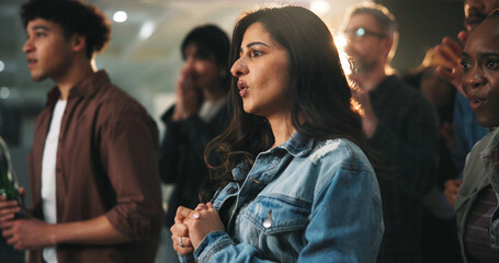 Fans, woman and watching tv with anxiety in pub for tournament stress, suspense and missed goal. Public screening, people and nervous in sports bar for live broadcast, football match or entertainment