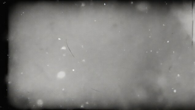 Aged, grainy monochrome film frame, featuring dust and scratches, faded appearance