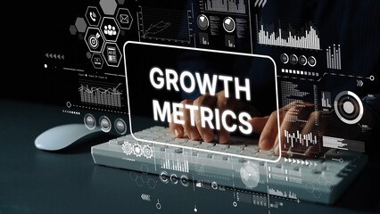 Business Analytics with Growth Metrics Displayed on a Digital Interface Over a Computer Keyboard and Hands in a Dark Environment. Asymptotic smart data analytic.