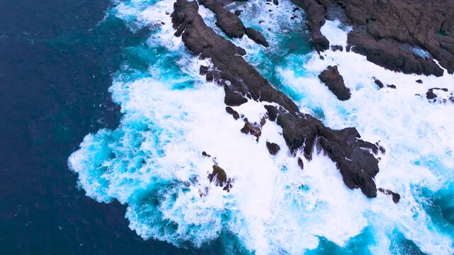 Choppy seas crash on Tenerife's volcanic coast at Charco del Viento