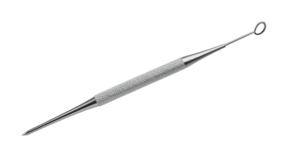 Silver instrument with loop and pointed tip, used for skin blemishes