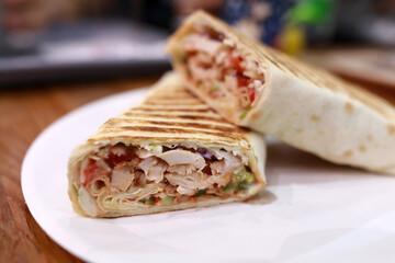 Chicken roll on white plate