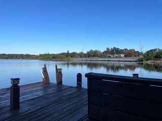 Lake Roy clear blue sky relaxing scene shady wooden deck area