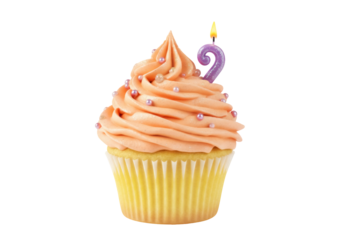 Festive cupcake with peach frosting and number two candle isolated PNG, birthday treat for celebration and party decoration
