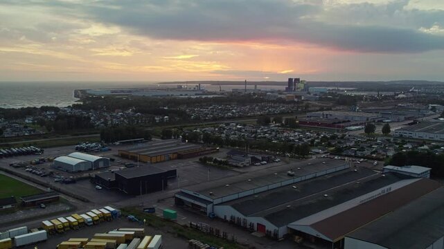 Sunset over Larsfrid industrial area in Halmstad, Sweden, serene evening sky