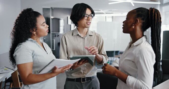 People, tablet and meeting in office with discussion for marketing internship, planning or document. Tech, advertising team or interns in workplace with research, paperwork or ideas for conversation.