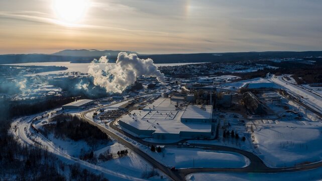 Aerial View of Industrial Complex in Winter at Sunset