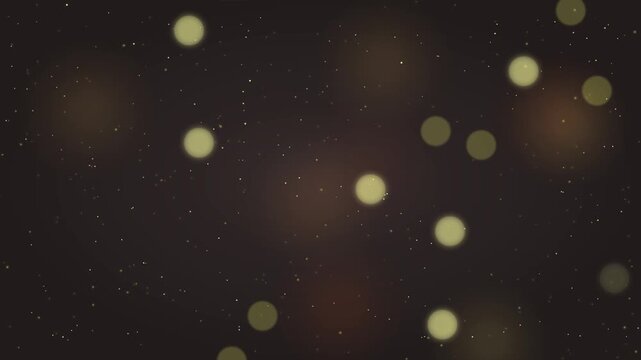 Abstract dark background with golden bokeh lights and tiny sparkling particles.