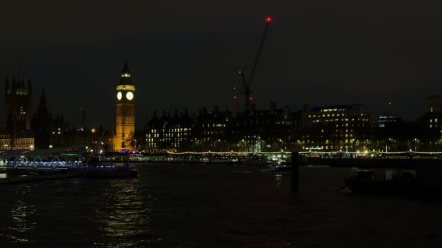 Night view of big ben and westminster on thames river