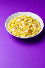 Pasta with chicken meatballs in a creamy sauce. Italian cuisine. Recipe.