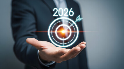 Fototapeta premium Businessman Holding Futuristic Digital Interface Showing 2026 Technology Vision.