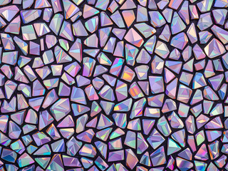 Fototapeta premium Abstract holographic crystal texture with iridescent rainbow reflections, creating a modern futuristic background ideal for luxury design, art, and digital visuals