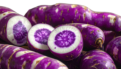 Close-up of vibrant purple vegetables, some halved, showcasing interior