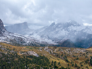 Fototapeta premium Aerial view of the Dolomites mountains in Italy, dramatic alpine landscape