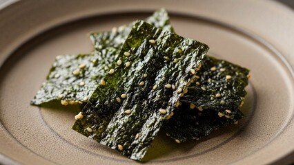 Crispy seasoned seaweed snack with sesame seeds, served on a beige textured plate, showcasing a delightful and healthy culinary experience, enhancing a modern lifestyle concept