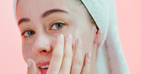 Beauty, face and girl with oil in studio for hyaluronic acid, hydration and healthy skincare...