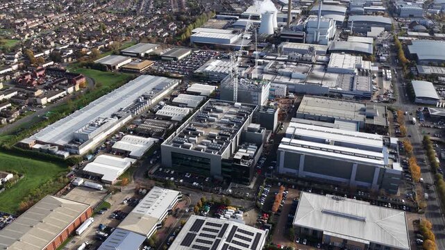 Aerial video of a modern data center in Slough, United Kingdom, computing infrastructure, storage servers, digital systems that process and large volumes of data for cloud and enterprise services.