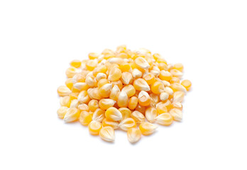 Raw corn grains isolated on white background