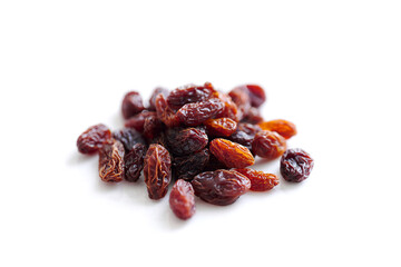 Dried raisins isolated on white background.