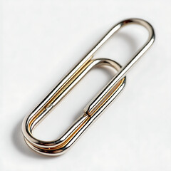 A single metal paperclip on a white background