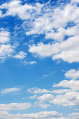 Naklejka premium White clouds in blue sky