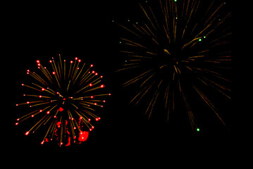 Fireworks lighting up the night sky. Pyrotechnics, abstract	