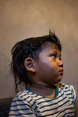 Side Portrait Of A Toddler