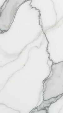 Marble with a white and gray pattern on it