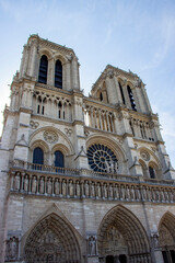 Fototapeta premium Notre Dame Cathedral Facade With Rose Window in Paris, France
