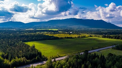 Aerial View of Green Fields and Mountains in Quebec, Canada