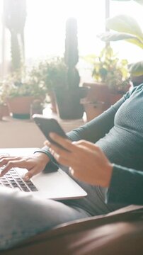 Remote work, phone or woman reading with laptop, check article feedback or editing draft for submission. Home, typing or freelance writer with tech to review story, plan solution or change feature