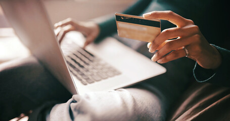 Hands, credit card and laptop on sofa for e commerce, easy payment or transaction in home. Person, computer and digital banking with fintech, bills or financial freedom for online shopping at house