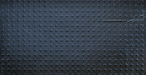 A sheet of black glossy bubble pattern cardboard texture