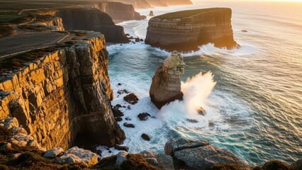 Rugged coastline with large waves crashing against rocky cliffs at sunset
