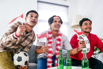 Friends Cheering for Soccer Team With Flags and Snacks