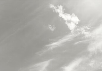 Sky with cloud dancer atmosphere and soft sunlight, airy cloudscape in off white tone, minimal