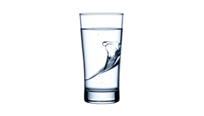 A tall, clear glass filled with water showing a dynamic splash, set against a dark, contrasting background