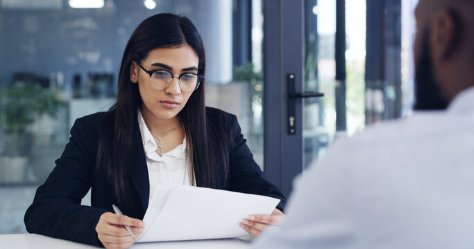 Interview, reading and woman in office with paper, CV review or process for onboarding. Meeting, applicant or hr in workplace with document, resume evaluation or recruitment for career opportunity