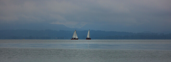 the germany chiemsee lake with boats panorama