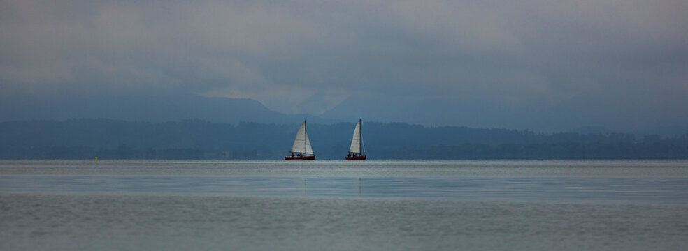 the germany chiemsee lake with boats panorama