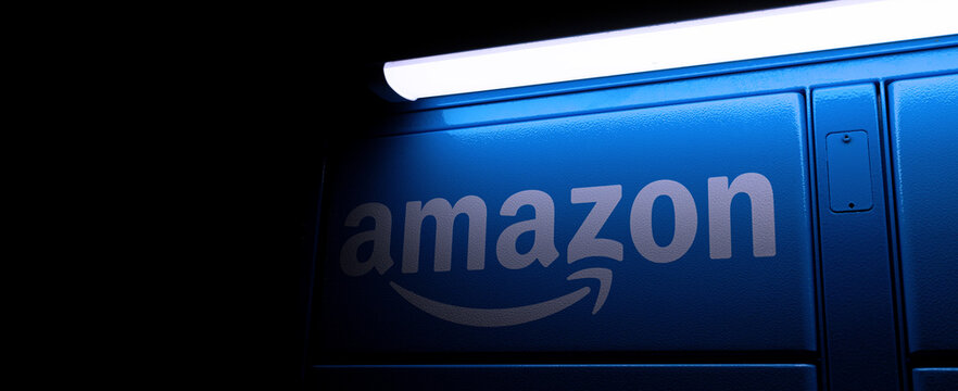 rosenheim, bavaria, germany - 24 07 2025: a amazon locker sign at night panorama