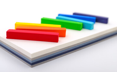 Colorful dry pastels on white background