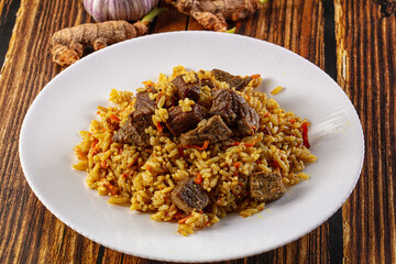 Asian traditional pilaf with beef