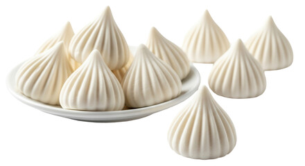 Traditional handmade white modaks on a minimalist ceramic plate
