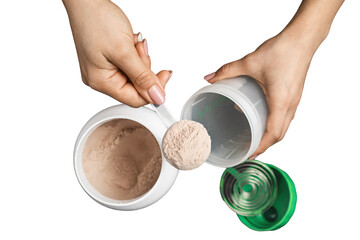 Top view of female hand putting scoop of chocolate whey protein powder into shaker with plastic protein jar, isolated on transparent background, concept of sport nutrition