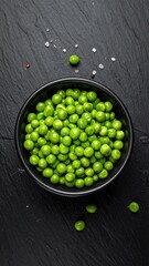 Green Peas in Black Bowl.